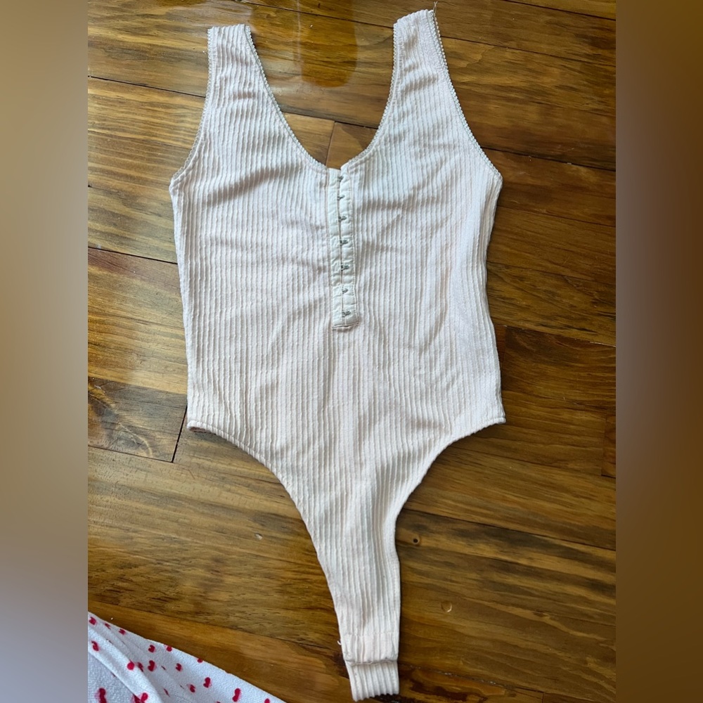 Baby pink thong bodysuit with corset detail